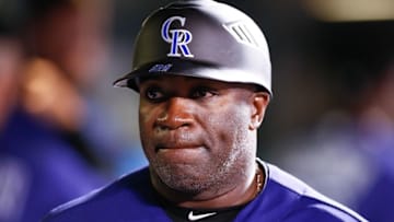 Apr 22, 2016; Denver, CO, USA; Colorado Rockies first base coach Eric Young (21) in the seventh inning against the Los Angeles Dodgers at Coors Field. Mandatory Credit: Isaiah J. Downing-USA TODAY Sports