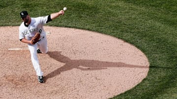 Apr 14, 2016; Denver, CO, USA; Colorado Rockies relief pitcher Boone Logan (48) delivers a pitch in the ninth inning against the San Francisco Giants at Coors Field. The Rockies defeated the Giants 11-6. Mandatory Credit: Isaiah J. Downing-USA TODAY Sports