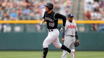 Jul 24, 2016; Denver, CO, USA; Colorado Rockies third baseman Nolan Arenado (28) rounds the bases after hitting a three run home run in the first inning against the Atlanta Braves at Coors Field. Mandatory Credit: Isaiah J. Downing-USA TODAY Sports