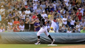 Jul 7, 2016; Denver, CO, USA; Colorado Rockies shortstop Trevor Story (27) celebrates the win over the Philadelphia Phillies at Coors Field. The Rockies defeated the Phillies 11-2. Mandatory Credit: Ron Chenoy-USA TODAY Sports