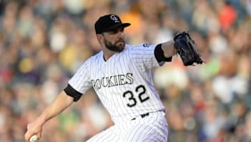May 27, 2016; Denver, CO, USA; Colorado Rockies starting pitcher Tyler Chatwood (32) delivers a pitch in the first inning against the San Francisco Giants at Coors Field. Mandatory Credit: Ron Chenoy-USA TODAY Sports