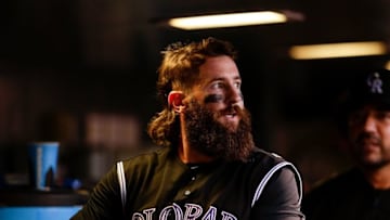Aug 6, 2016; Denver, CO, USA; Colorado Rockies center fielder Charlie Blackmon (19) in the dugout after scoring in the sixth inning against the Miami Marlins at Coors Field. Mandatory Credit: Isaiah J. Downing-USA TODAY Sports