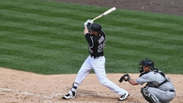 Aug 7, 2016; Denver, CO, USA; Colorado Rockies left fielder David Dahl (26) singles in the fifth inning against the Miami Marlins at Coors Field. Mandatory Credit: Ron Chenoy-USA TODAY Sports