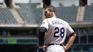 Aug 11, 2016; Arlington, TX, USA; Colorado Rockies third baseman Nolan Arenado (28) looks into the Texas Rangers dugout after getting a single in the third inning at Globe Life Park in Arlington. Mandatory Credit: Tim Heitman-USA TODAY Sports