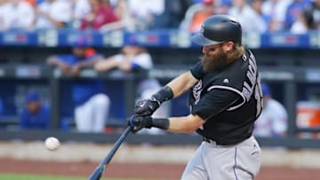 Jul 29, 2016; New York City, NY, USA; Colorado Rockies centerfielder Charlie Blackmon (19) singles against the New York Mets during the first inning at Citi Field. The Rockies won 6-1. Mandatory Credit: Andy Marlin-USA TODAY Sports