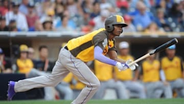 Jul 10, 2016; San Diego, CA, USA; World batter Raimel Tapia hits a two-run double in the 9th inning during the All Star Game futures baseball game at PetCo Park. Mandatory Credit: Gary A. Vasquez-USA TODAY Sports