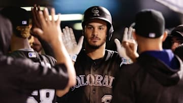 Sep 7, 2016; Denver, CO, USA; Colorado Rockies third baseman Nolan Arenado (28) celebrates with teammates after his one run home run in the ninth inning against the San Francisco Giants at Coors Field. Mandatory Credit: Isaiah J. Downing-USA TODAY Sports