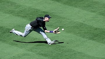 Sep 11, 2016; San Diego, CA, USA; Colorado Rockies left fielder David Dahl (26) makes a catch on a ball hit by San Diego Padres first baseman Wil Myers (not pictured) during the fourth inning at Petco Park. Mandatory Credit: Jake Roth-USA TODAY Sports