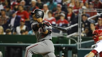 Sep 26, 2016; Washington, DC, USA; Arizona Diamondbacks second baseman Jean Segura (2) hits a solo home run against the Washington Nationals during the fourth inning at Nationals Park. Mandatory Credit: Brad Mills-USA TODAY Sports