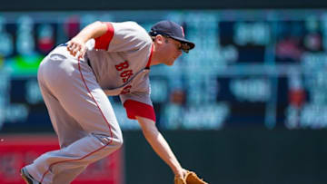 Jun 12, 2016; Minneapolis, MN, USA; Boston Red Sox third baseman Josh Rutledge (32) fields a ground ball in the second inning against the Minnesota Twins at Target Field. Mandatory Credit: Brad Rempel-USA TODAY Sports