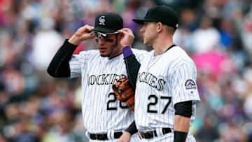 May 11, 2016; Denver, CO, USA; Colorado Rockies third baseman Nolan Arenado (28) talks with shortstop Trevor Story (27) in the fourth inning against the Arizona Diamondbacks at Coors Field. Mandatory Credit: Isaiah J. Downing-USA TODAY Sports