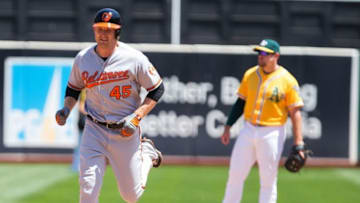 Aug 11, 2016; Oakland, CA, USA; Baltimore Orioles right fielder Mark Trumbo (45) rounds the bases on a three run home run against the Oakland Athletics during the fifth inning at O.co Coliseum. Mandatory Credit: Kelley L Cox-USA TODAY Sports