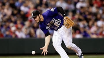 Sep 19, 2016; Denver, CO, USA; Colorado Rockies third baseman Nolan Arenado (28) fields the ball in the sixth inning against the St. Louis Cardinals at Coors Field. Mandatory Credit: Isaiah J. Downing-USA TODAY Sports