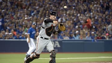 Jul 31, 2016; Toronto, Ontario, CAN; Baltimore Orioles catcher Matt Wieters (32) throws a ball to first base for an out during the fourth inning of the game against the Toronto Blue Jays at Rogers Centre. Mandatory Credit: Nick Turchiaro-USA TODAY Sports