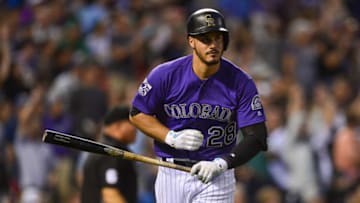DENVER, CO - JULY 27: Nolan Arenado #28 of the Colorado Rockies tosses his bat after hitting a fifth inning solo homerun against the Oakland Athletics during interleave play at Coors Field on July 27, 2018 in Denver, Colorado. (Photo by Dustin Bradford/Getty Images)