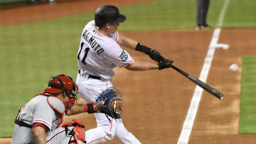 MIAMI, FL - SEPTEMBER 4: J.T. Realmuto #11 of the Miami Marlins hits a home run in the first inning against the Philadelphia Phillies at Marlins Park on September 4, 2018 in Miami, Florida. (Photo by Eric Espada/Getty Images)