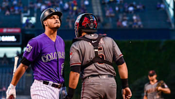 DENVER, CO - SEPTEMBER 10: Nolan Arenado #28 of the Colorado Rockies reacts after striking out in the first inning of a game against the Arizona Diamondbacks at Coors Field on September 10, 2018 in Denver, Colorado. (Photo by Dustin Bradford/Getty Images)