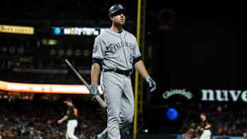 SAN FRANCISCO, CA - SEPTEMBER 15: Tom Murphy #23 of the Colorado Rockies returns to the dugout after striking out against the San Francisco Giants during the seventh inning at AT&T Park on September 15, 2018 in San Francisco, California. The San Francisco Giants defeated the Colorado Rockies 3-0. (Photo by Jason O. Watson/Getty Images)