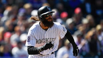 DENVER, CO - SEPTEMBER 30: Charlie Blackmon #19 of the Colorado Rockies watches the flight of a third inning two-run homerun against the Washington Nationals at Coors Field on September 30, 2018 in Denver, Colorado. (Photo by Dustin Bradford/Getty Images)