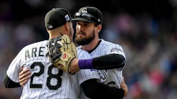 DENVER, CO - SEPTEMBER 30: Nolan Arenado #28 and David Dahl #26 of the Colorado Rockies celebrate after a 12-0 win over the Washington Nationals at Coors Field on September 30, 2018 in Denver, Colorado. (Photo by Dustin Bradford/Getty Images)