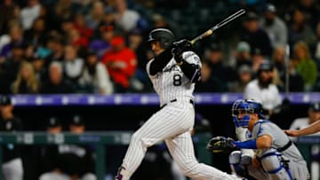 DENVER, CO - APRIL 6: Josh Fuentes #8 of the Colorado Rockies follows through on his first career hit during the eighth inning against the Los Angeles Dodgers at Coors Field on April 6, 2019 in Denver, Colorado. (Photo by Justin Edmonds/Getty Images)