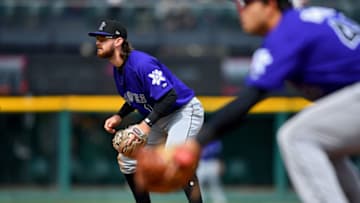TACOMA, WASHINGTON - APRIL 15: Brendan Rodgers #1 and Roberto Ramos #44 of the Albuquerque Isotopes stays ready during a pitch delivery against the Tacoma Rainiers at Cheney Stadium on April 15, 2019 in Tacoma, Washington. The Tacoma Rainiers beat the Albuquerque Isotopes 10-0. (Photo by Alika Jenner/Getty Images)