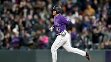 DENVER, COLORADO - APRIL 22: Mark Reynolds #12 of the Colorado Rockies circles the bases after hitting a 2 RBI home run in the fifth inning against the Washington Nationals at Coors Field on April 22, 2019 in Denver, Colorado. (Photo by Matthew Stockman/Getty Images)