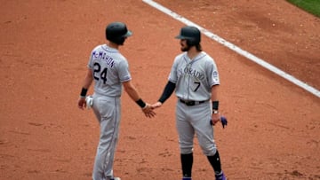PITTSBURGH, PA - MAY 23: Brendan Rodgers #7 of the Colorado Rockies celebrates his two RBI single in the sixth inning with Ryan McMahon #24 of the Colorado Rockies against the Pittsburgh Pirates at PNC Park on May 23, 2019 in Pittsburgh, Pennsylvania. (Photo by Justin K. Aller/Getty Images)