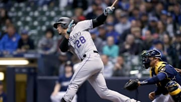 MILWAUKEE, WISCONSIN - MAY 01: Nolan Arenado #28 of the Colorado Rockies hits a home run in the first inning against the Milwaukee Brewers at Miller Park on May 01, 2019 in Milwaukee, Wisconsin. (Photo by Dylan Buell/Getty Images)