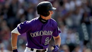 DENVER, COLORADO - MAY 05: Ryan McMahon #24 of the Colorado Rockies hits a RBI single in the eighth inning against the Arizona Diamondbacks at Coors Field on May 05, 2019 in Denver, Colorado. (Photo by Matthew Stockman/Getty Images)