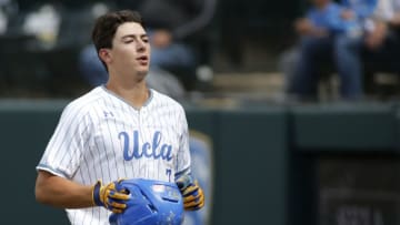 LOS ANGELES, CALIFORNIA - MAY 19: Michael Toglia #7 of UCLA looks to the dugout following his home run during a baseball game against University of Washington at Jackie Robinson Stadium on May 19, 2019 in Los Angeles, California. (Photo by Katharine Lotze/Getty Images)