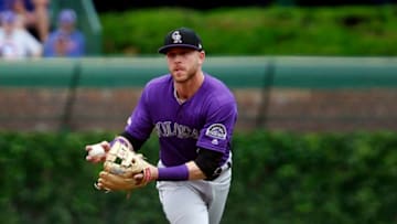 CHICAGO, ILLINOIS - JUNE 06: Trevor Story #27 of the Colorado Rockies fields a ball hit by Kyle Schwarber #12 of the Chicago Cubs during the first inning at Wrigley Field on June 06, 2019 in Chicago, Illinois. (Photo by Nuccio DiNuzzo/Getty Images)