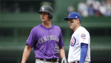 CHICAGO, ILLINOIS - JUNE 06: Peter Lambert #23 of the Colorado Rockies following his single against the Chicago Cubs during the third inning at Wrigley Field on June 06, 2019 in Chicago, Illinois. (Photo by Nuccio DiNuzzo/Getty Images)