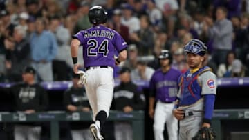 DENVER, COLORADO - JUNE 11: Ryan McMahon #24 of the Colorado Rockies scores on a Raimel Tapia RBI single in the sixth inning against the Chicago Cubs at Coors Field on June 11, 2019 in Denver, Colorado. (Photo by Matthew Stockman/Getty Images)