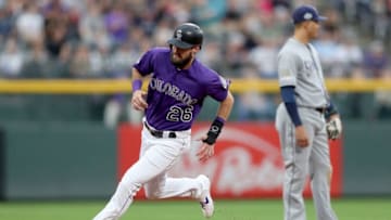 DENVER, COLORADO - JUNE 13: David Dahl #26 of the Colorado Rockies rounds third base to score on a Ian Desmond 2 RBI double in the first inning against the San Diego Padres at Coors Field on June 13, 2019 in Denver, Colorado. (Photo by Matthew Stockman/Getty Images)