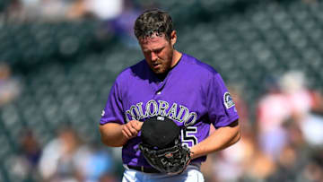 DENVER, CO - AUGUST 14: Scott Oberg #45 of the Colorado Rockies pause on the mound after allowing a go-ahead run in the ninth inning of a game against the Arizona Diamondbacks at Coors Field on August 14, 2019 in Denver, Colorado. (Photo by Dustin Bradford/Getty Images)