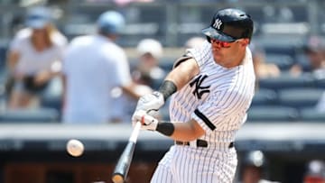 NEW YORK, NEW YORK - JULY 21: Mike Tauchman #39 of the New York Yankees hits a home run to right field in the fifth inning against the Colorado Rockies at Yankee Stadium on July 21, 2019 in New York City. (Photo by Mike Stobe/Getty Images)