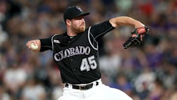 DENVER, COLORADO - AUGUST 02: Pitcher Scott Oberg #45 of the Colorado Rockies throws in the ninth inning against the San Francisco Giants at Coors Field on August 02, 2019 in Denver, Colorado. (Photo by Matthew Stockman/Getty Images)
