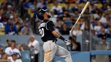 LOS ANGELES, CA - SEPTEMBER 04: Ian Desmond #20 of the Colorado Rockies throws his bat as he reacts to striking out during the seventh inning at Dodger Stadium on September 4, 2019 in Los Angeles, California. (Photo by Kevork Djansezian/Getty Images)