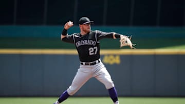 CINCINNATI, OH - JULY 28: Trevor Story #27 of the Colorado Rockies throws a runner out during a game against the Cincinnati Reds at Great American Ball Park on July 28, 2019 in Cincinnati, Ohio. The Reds won 3-2. (Photo by Joe Robbins/Getty Images)