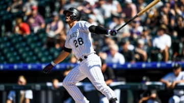 DENVER, CO - SEPTEMBER 1: Nolan Arenado #28 of the Colorado Rockies follows the flight of a sixth inning solo home run against the Pittsburgh Pirates at Coors Field on September 1, 2019 in Denver, Colorado. (Photo by Dustin Bradford/Getty Images)