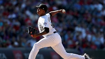 DENVER, COLORADO - SEPTEMBER 12: Yency Almonte #62 of the Colorado Rockies throws in the eighth inning against the St Louis Cardinals at Coors Field on September 12, 2019 in Denver, Colorado. (Photo by Matthew Stockman/Getty Images)