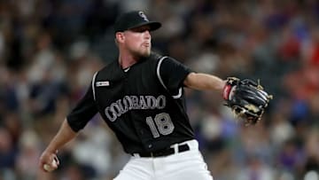 DENVER, COLORADO - SEPTEMBER 13: Pitcher Wes Parsons #18 of the Colorado Rockies throws in the sixth inning against the San Diego Padres at Coors Field on September 13, 2019 in Denver, Colorado. (Photo by Matthew Stockman/Getty Images)