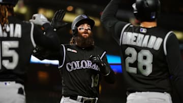 SAN FRANCISCO, CALIFORNIA - SEPTEMBER 24: Charlie Blackmon #19 of the Colorado Rockies celebrates a three run home run with Raimel Tapia #15 and Nolan Arenado #28 during the sixteenth inning against the San Francisco Giants at Oracle Park on September 24, 2019 in San Francisco, California. (Photo by Daniel Shirey/Getty Images)