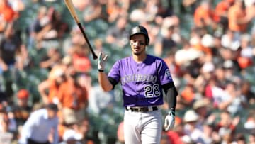 SAN FRANCISCO, CALIFORNIA - SEPTEMBER 26: Nolan Arenado #28 of the Colorado Rockies tosses his bat after he struck out to end the seven inning against the San Francisco Giants at Oracle Park on September 26, 2019 in San Francisco, California. (Photo by Ezra Shaw/Getty Images)