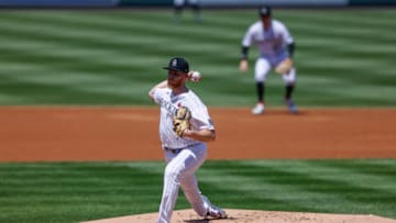 DENVER, CO - AUGUST 16: Starting pitcher Jon Gray #55 of the Colorado Rockies delivers to home plate during the first inning against the Texas Rangers at Coors Field on August 16, 2020 in Denver, Colorado. (Photo by Justin Edmonds/Getty Images)