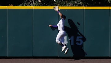 DENVER, CO - SEPTEMBER 2: Centerfielder Kevin Pillar #11 of the Colorado Rockies makes a leaping catch at the wall for the final out of the seventh inning against the San Francisco Giants at Coors Field on September 2, 2020 in Denver, Colorado. (Photo by Justin Edmonds/Getty Images)