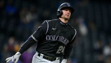 DENVER, CO - APRIL 6: Ryan McMahon #24 of the Colorado Rockies gestures to celebrate his third home run of the game, a seventh-inning solo shot, against the Arizona Diamondbacks at Coors Field on April 6, 2021 in Denver, Colorado. (Photo by Dustin Bradford/Getty Images)