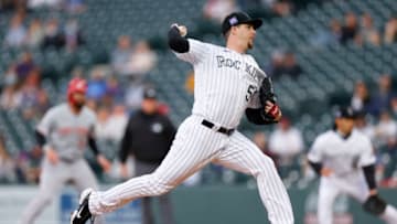 DENVER, CO - MAY 13: Starting pitcher Chi Chi Gonzalez #50 of the Colorado Rockies delivers to home plate during the first inning against the Cincinnati Reds at Coors Field on May 13, 2021 in Denver, Colorado. (Photo by Justin Edmonds/Getty Images)