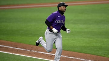 ARLINGTON, TEXAS - JULY 22: Matt Kemp #25 of the Colorado Rockies singles against the Texas Rangers in the sixth inning during a MLB exhibition game at Globe Life Field on July 22, 2020 in Arlington, Texas. (Photo by Ronald Martinez/Getty Images)